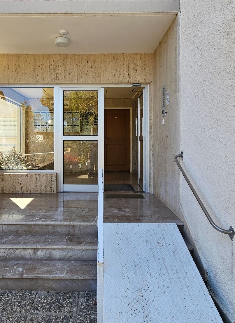 Building entrance with keypad next to the door